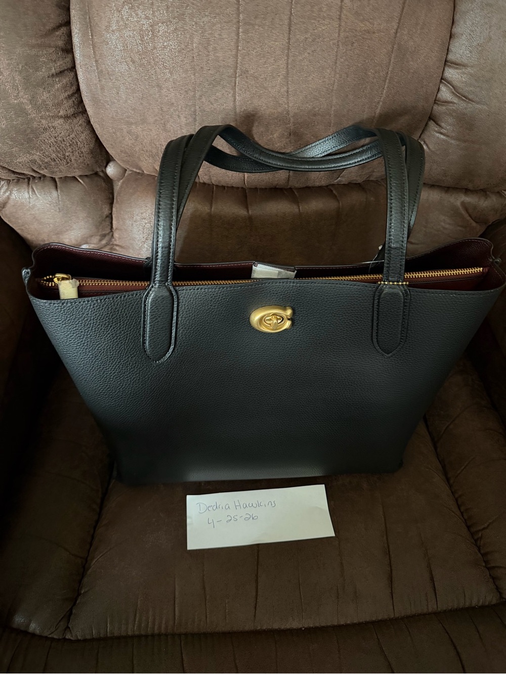 Coach Black Leather Tote with Gold Turnlock and Burgundy Interior